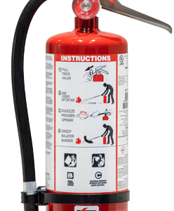 Red fire extinguisher with an attached hose and instruction label showing operating steps, mounted on a base.